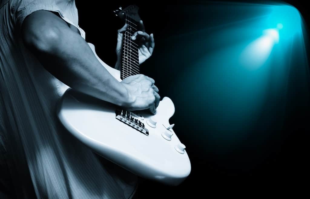 Fototapeta Gitarzysta w Świetle Reflektorów